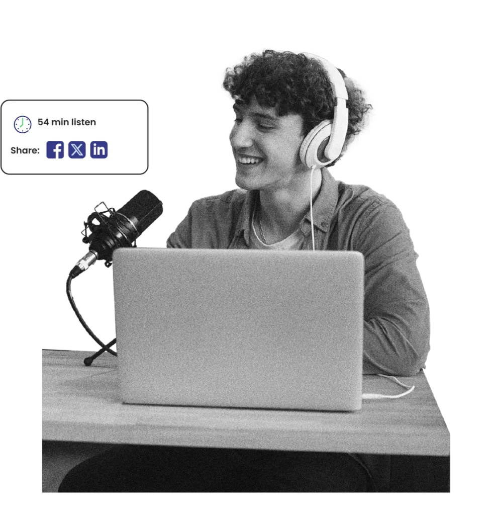 Podcast host recording an episode at a laptop with a studio microphone