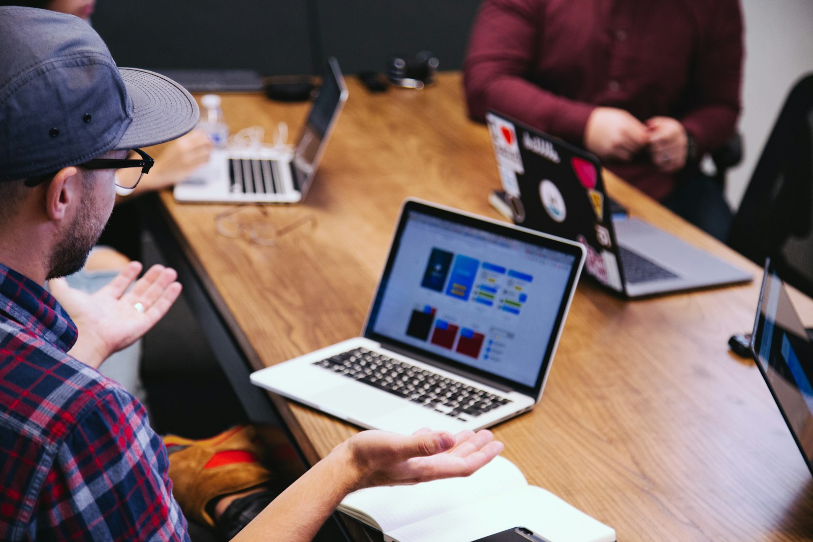 A founder discussing go-to-market strategy in a startup team meeting